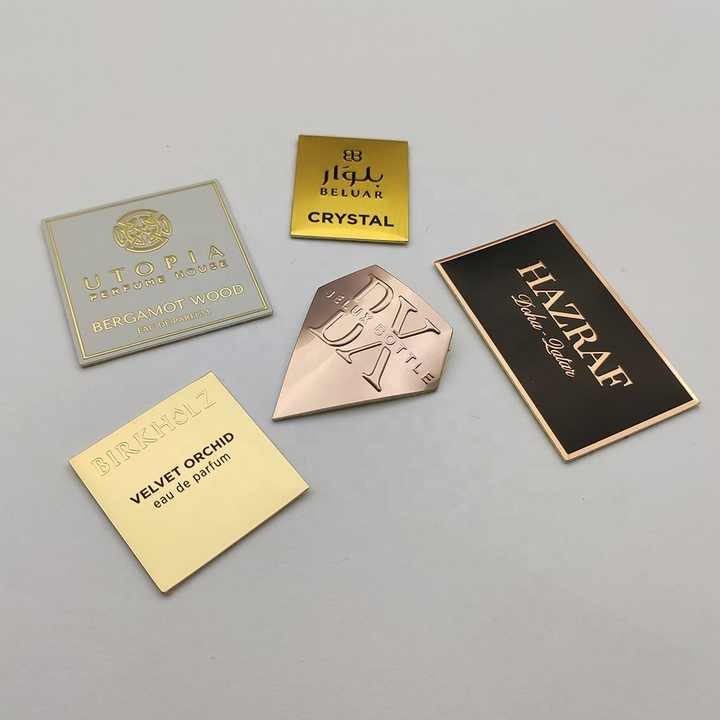 Hot sales customized designs aluminium embossed logo sticker metal perfume bottle packaging label